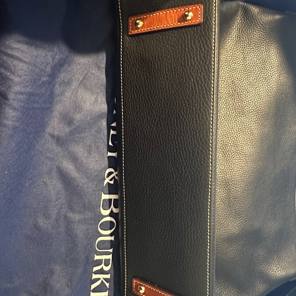 Black and tan leather Donny & Burke should bag. Condition: Like new $200